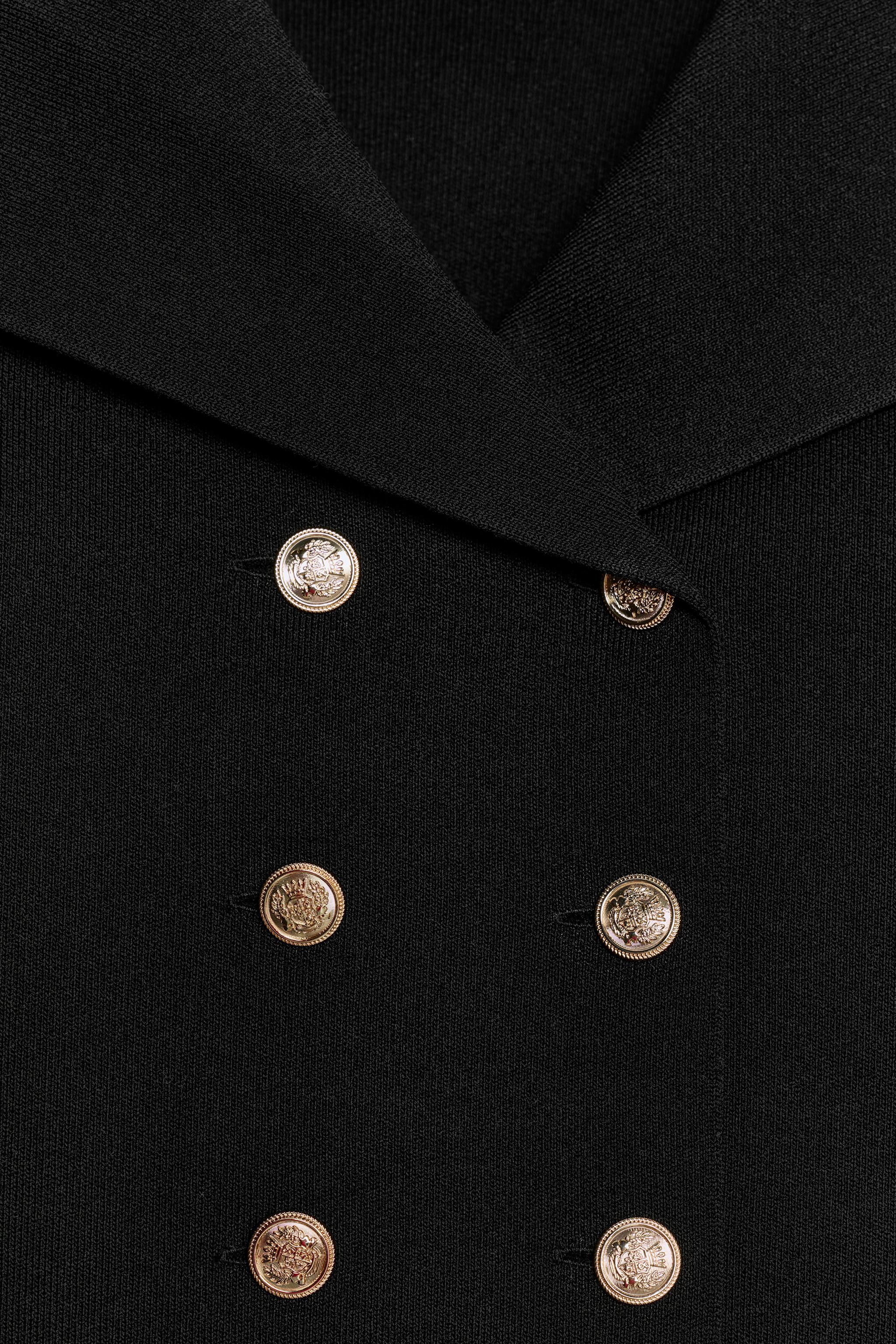 GILET COURT EN MAILLE CROISÉ